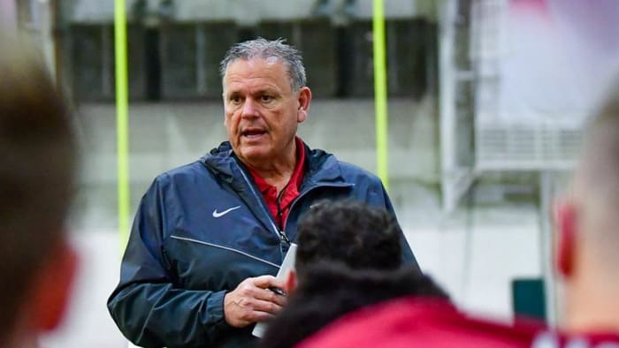 Arkansas coach Sam Pittman addresses the team during spring practices.